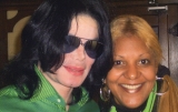 Michael WIth His Former Manager. Looking Stunning In A Rich Silk Green Shirt.